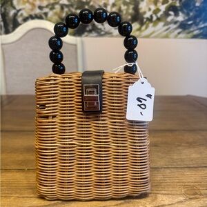 Elegant Brown Wicker Handbag with Black Accents